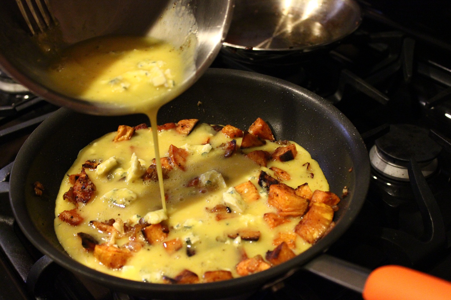 https://corkandspoon.files.wordpress.com/2013/01/tortilla-espanola-sweet-potato-adding-egg.jpg